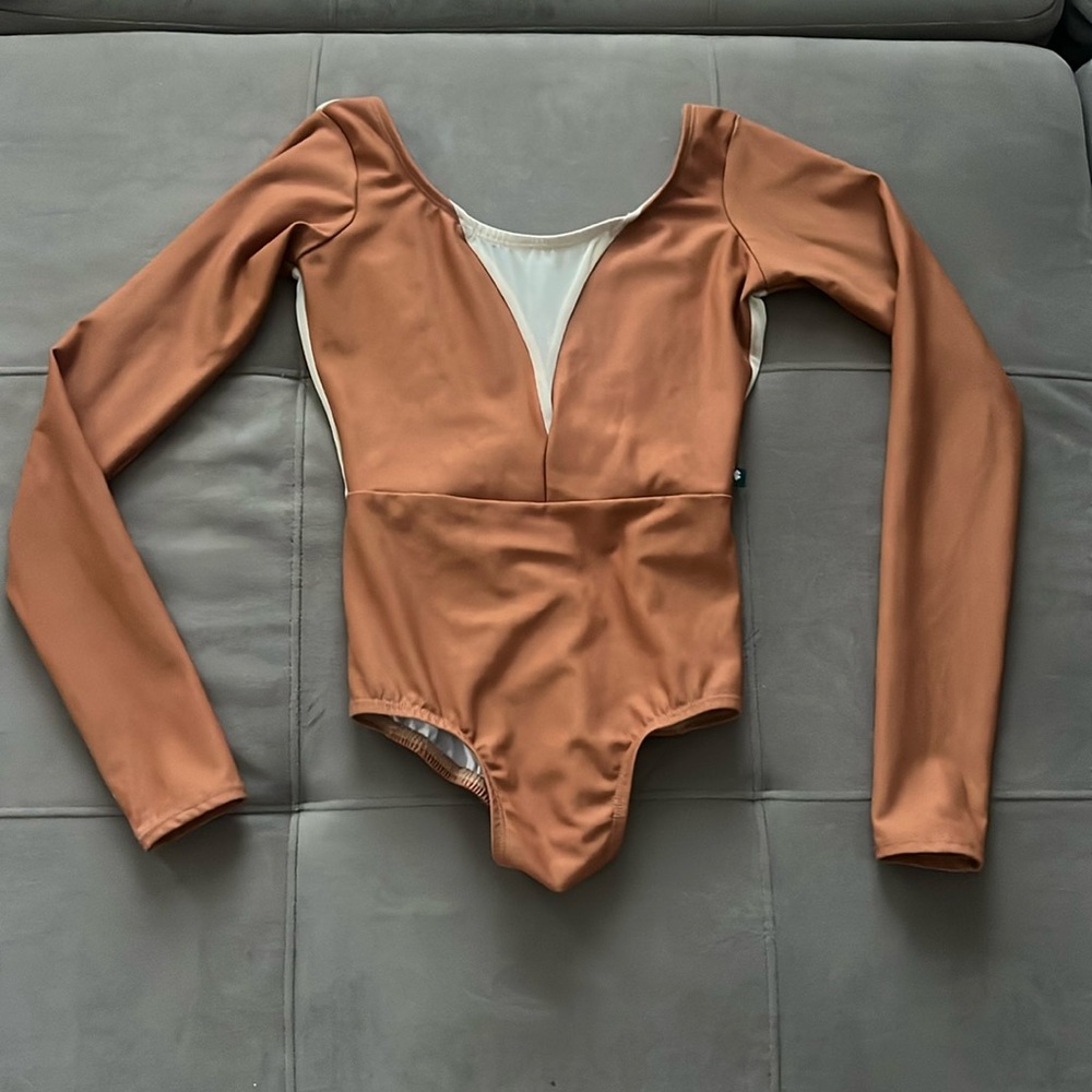 Luckyleo “Dart” style with full long sleeves. Caramel nylon cream mesh.